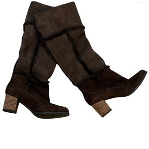 ROCKPORT genuine leather fleece lined high heeled boots. Size 6 with 2” heel.